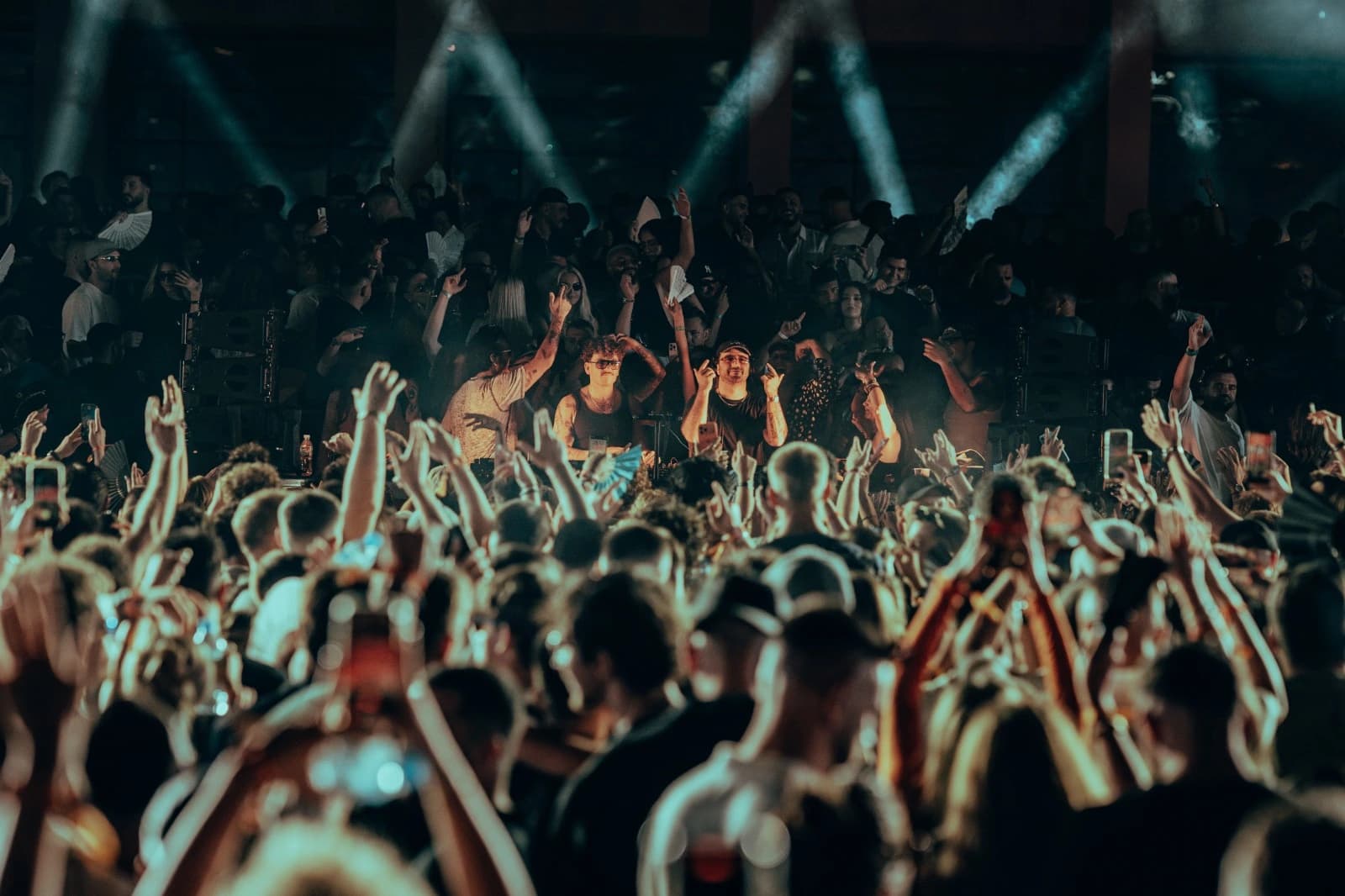 ANOTR at Skanderbeg Square, Tirana, 29 August 2026 · hands up under the stage lights, photograph 4 of 4.
